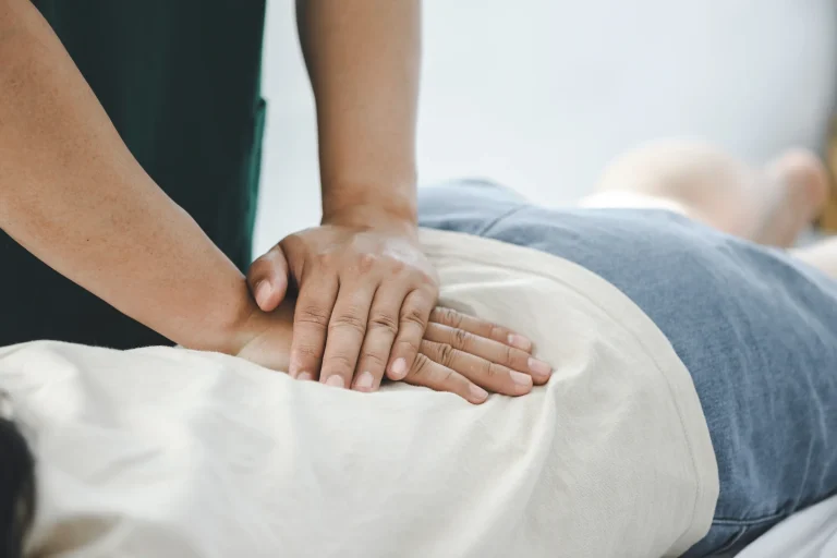 chiropractor in Boulder performing a spinal adjustment