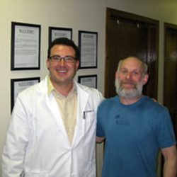Dr. Jonathan Schnelle with patient Rick at Choice Chiropractic & Wellness Center in Boulder