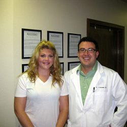 Dr. Jonathan Schnelle with patient Sarah at Choice Chiropractic & Wellness Center in Boulder