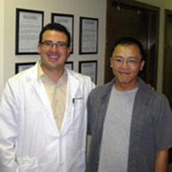 Dr. Jonathan Schnelle with patient Tommy at Choice Chiropractic & Wellness Center in Boulder